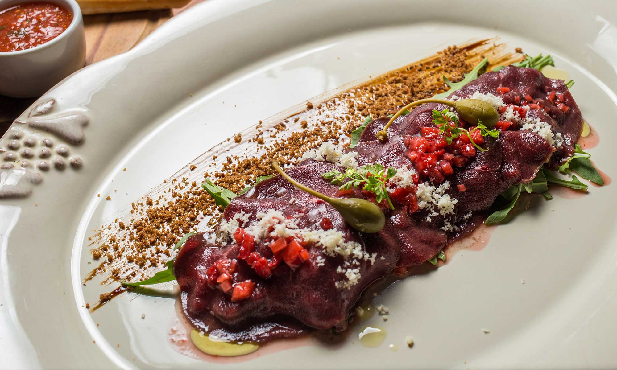 Carpaccio di cervo marinato, un piatto tra tradizione e creatività